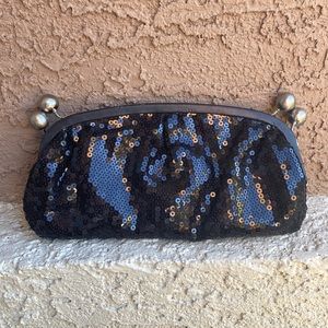 BCBGirls sequin black clutch